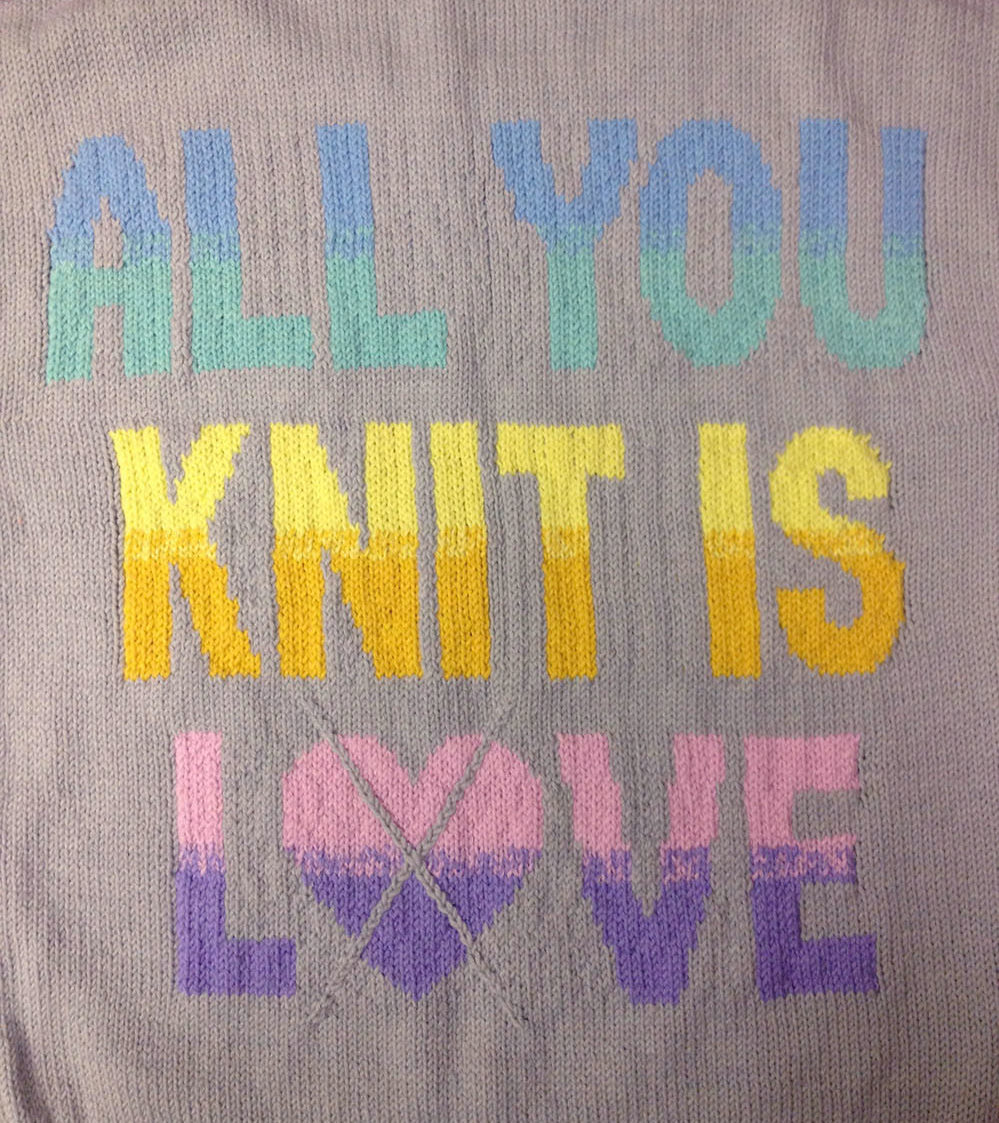 “All You Knit Is Love” Heart-Gyle Sweater